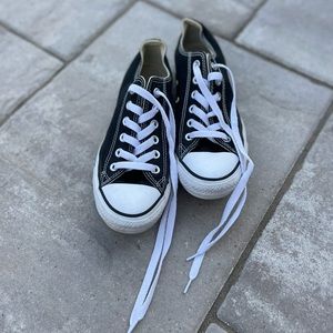 CONVERSE Black low top. Womens size 7. Mens size 5. Gently used.